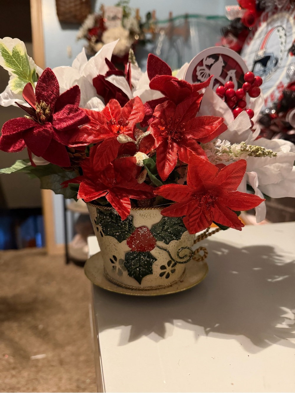Hand Crafted Red and White Poinsettia Teacup Arrangement